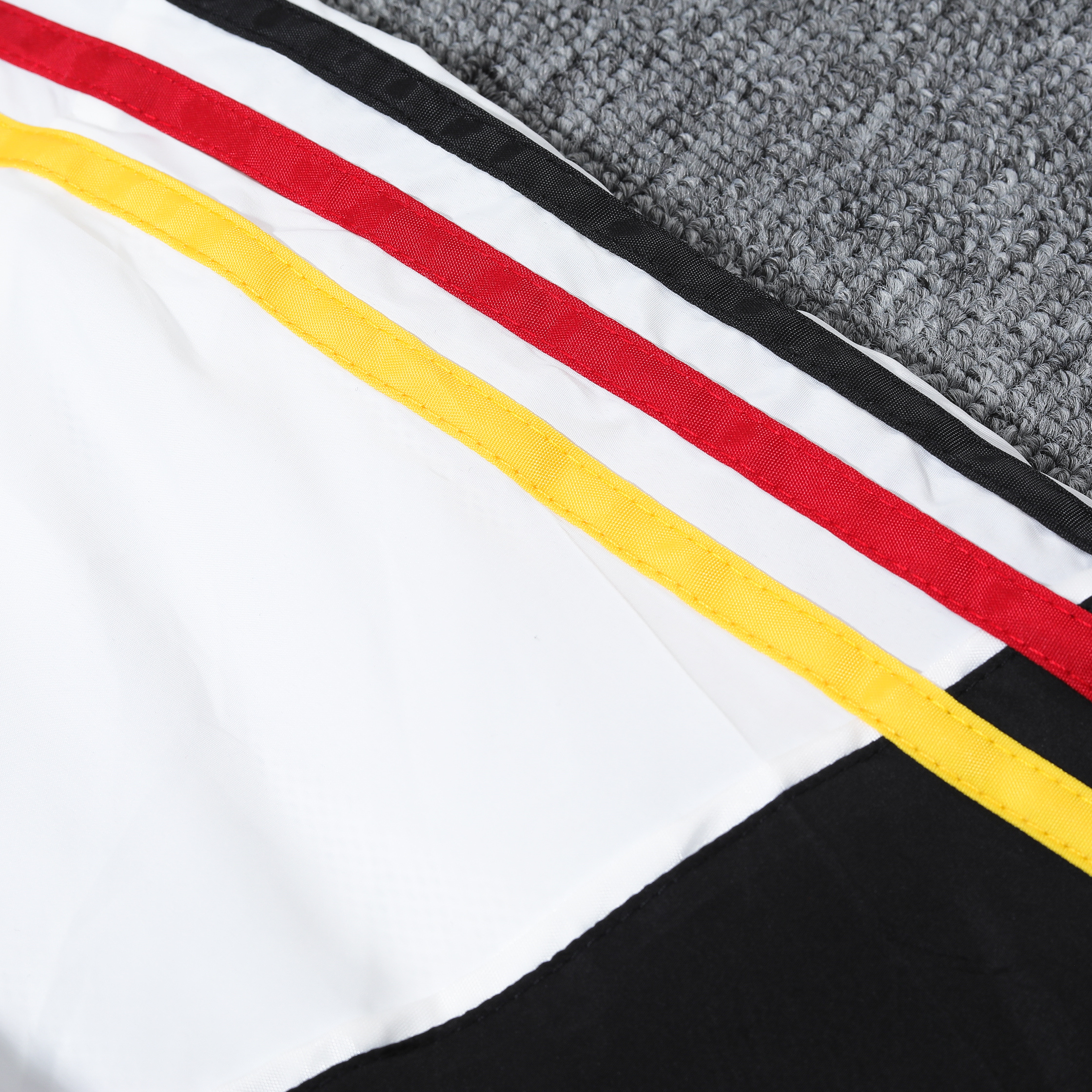 AlphaJersey-Germany 2024 National Flag Tricolor Hooded Windbreaker - Player Version