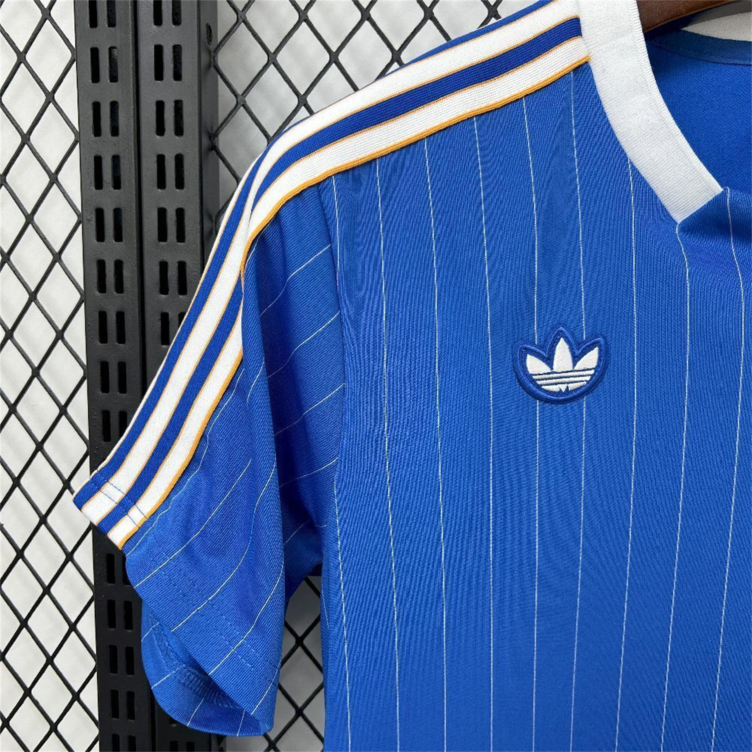 AlphaJersey-Real Madrid 25-26 Trefoil White Lines Blue Travel Jersey - Fans Version