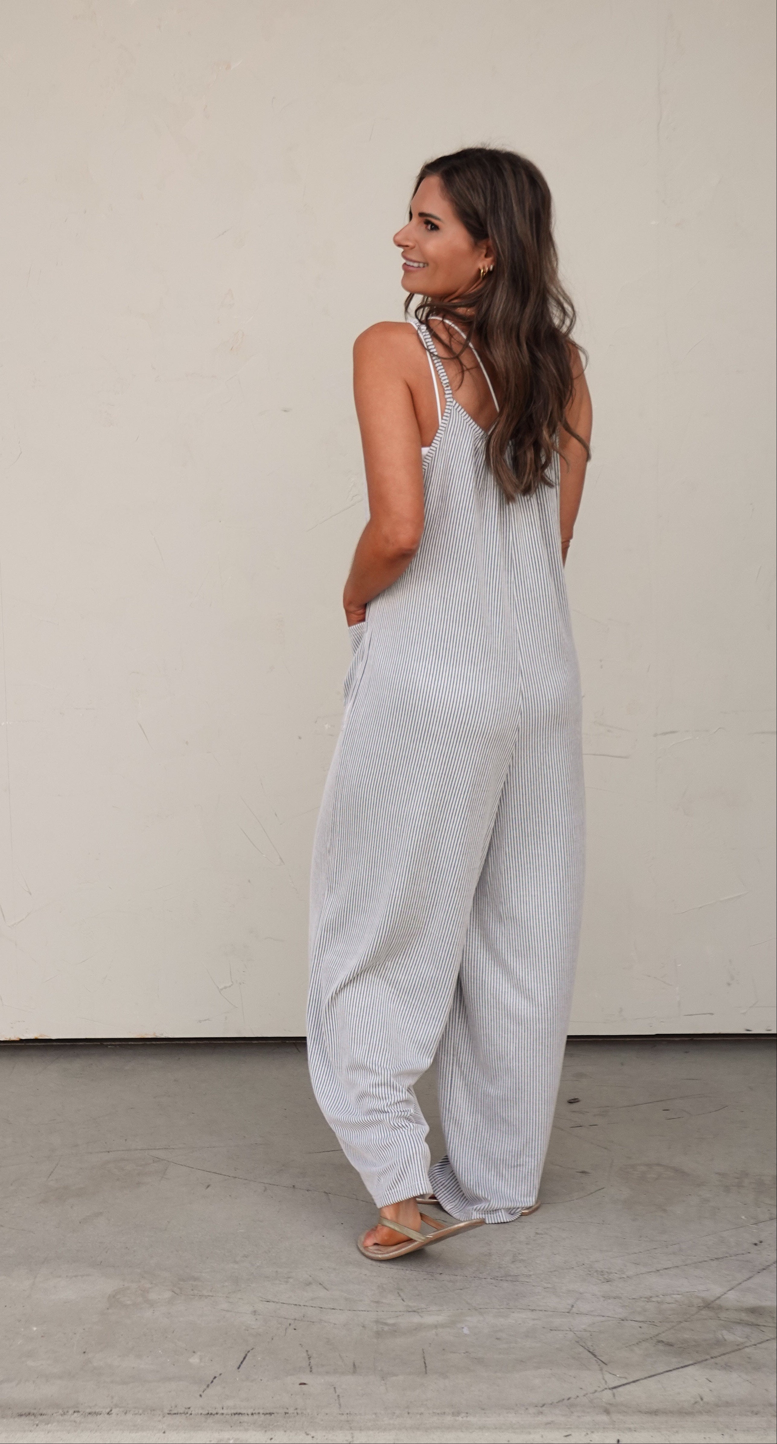 Pinstripe Sleeveless Slouchy Jumpsuit | Elegant Women's Fashion by coolavocek