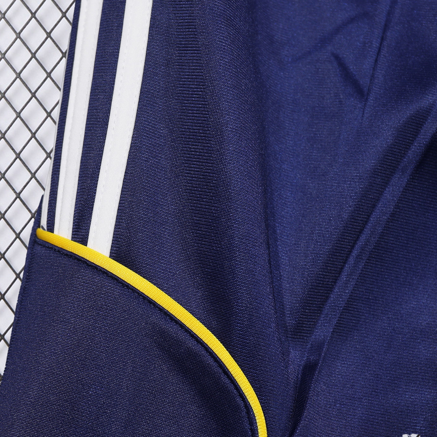 AlphaJersey-Real Madrid 25-26 Pure Color Yellow Lines Training Set - Dark Blue Top and Dark Blue Pants