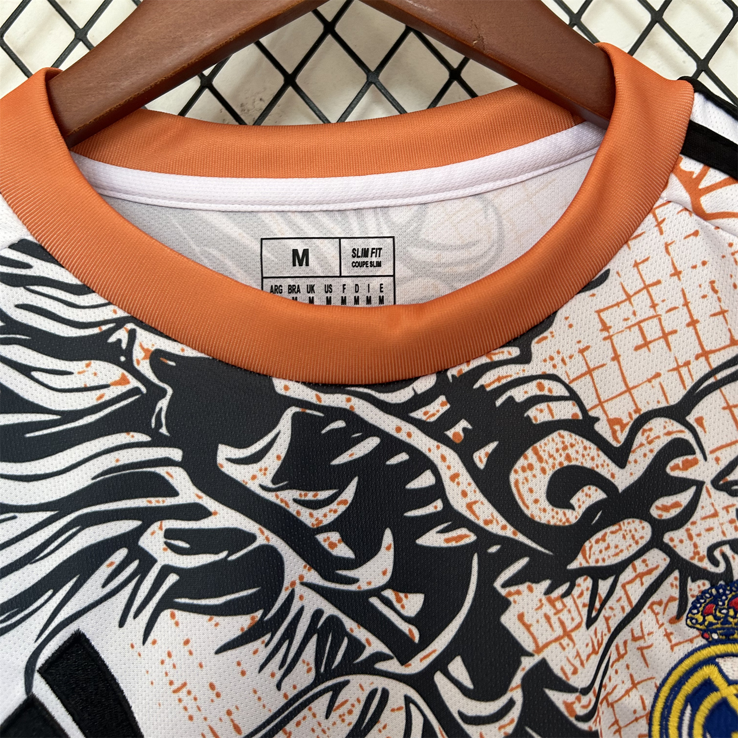 AlphaJersey-Real Madrid 25-26 Black Dragon Orange Dragon White Special Edition Jersey - Fans Version