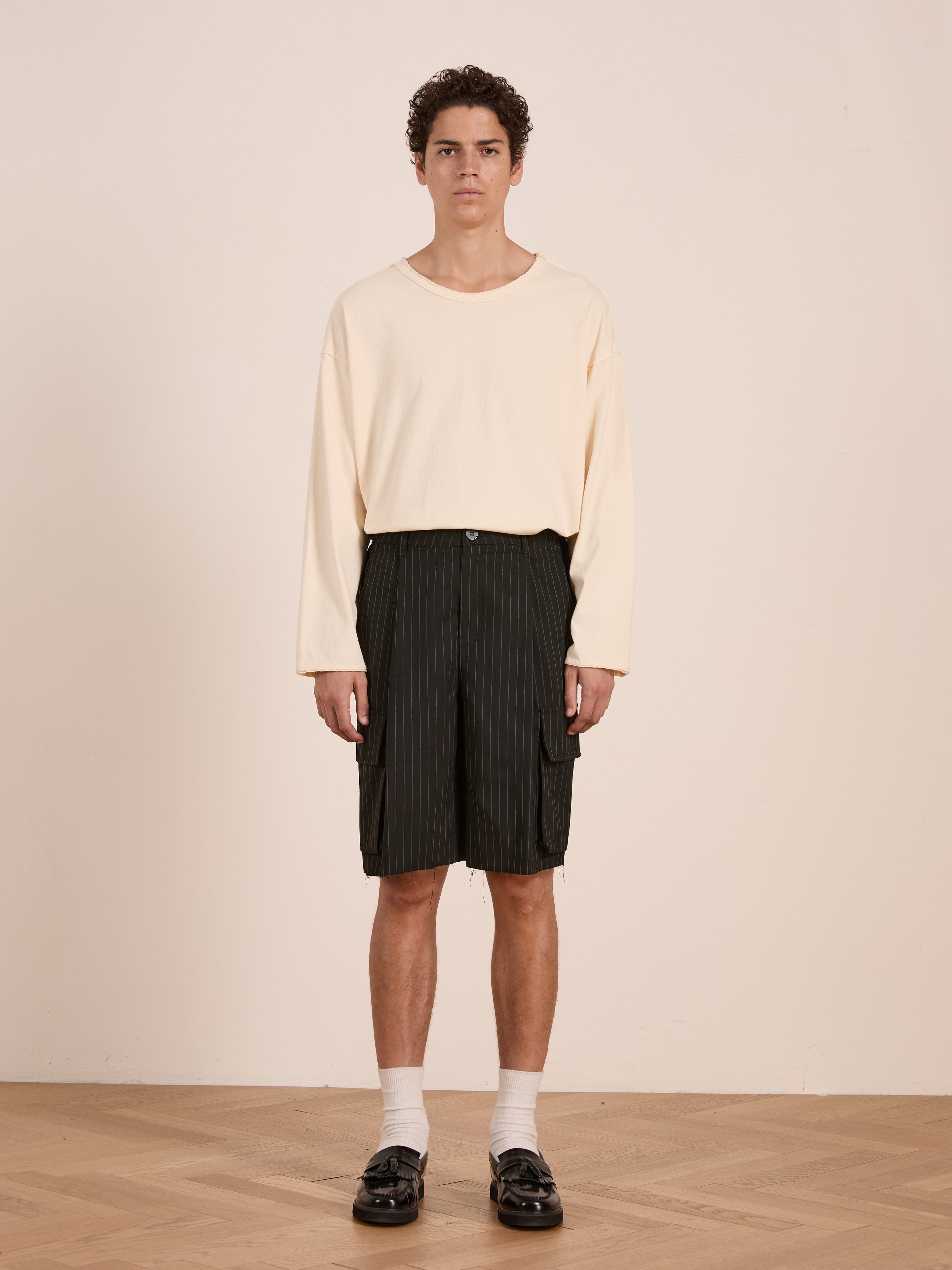 Hava Pinstripe Pleated Cargo Trouser Shorts | Modern Menswear by yycbvcnbmmnbm