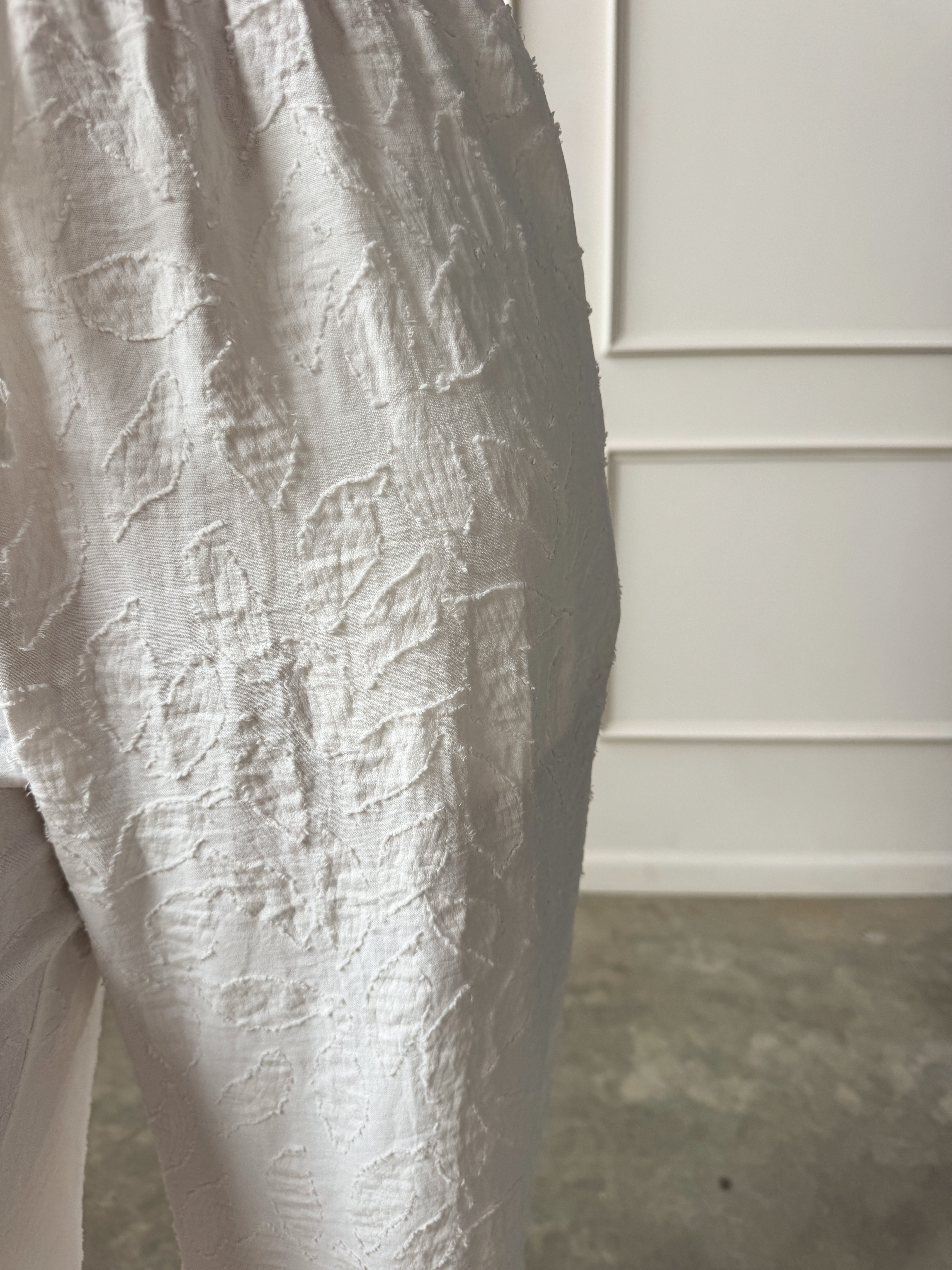 Off-White Textured Drawstring Pant | Elegant Women's Fashion by coolavocek