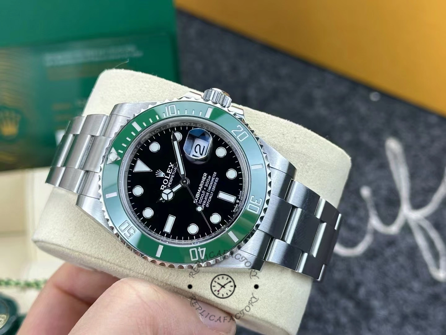 Rolex Submariner 126610LV close-up after 3 years, showing date window clarity.