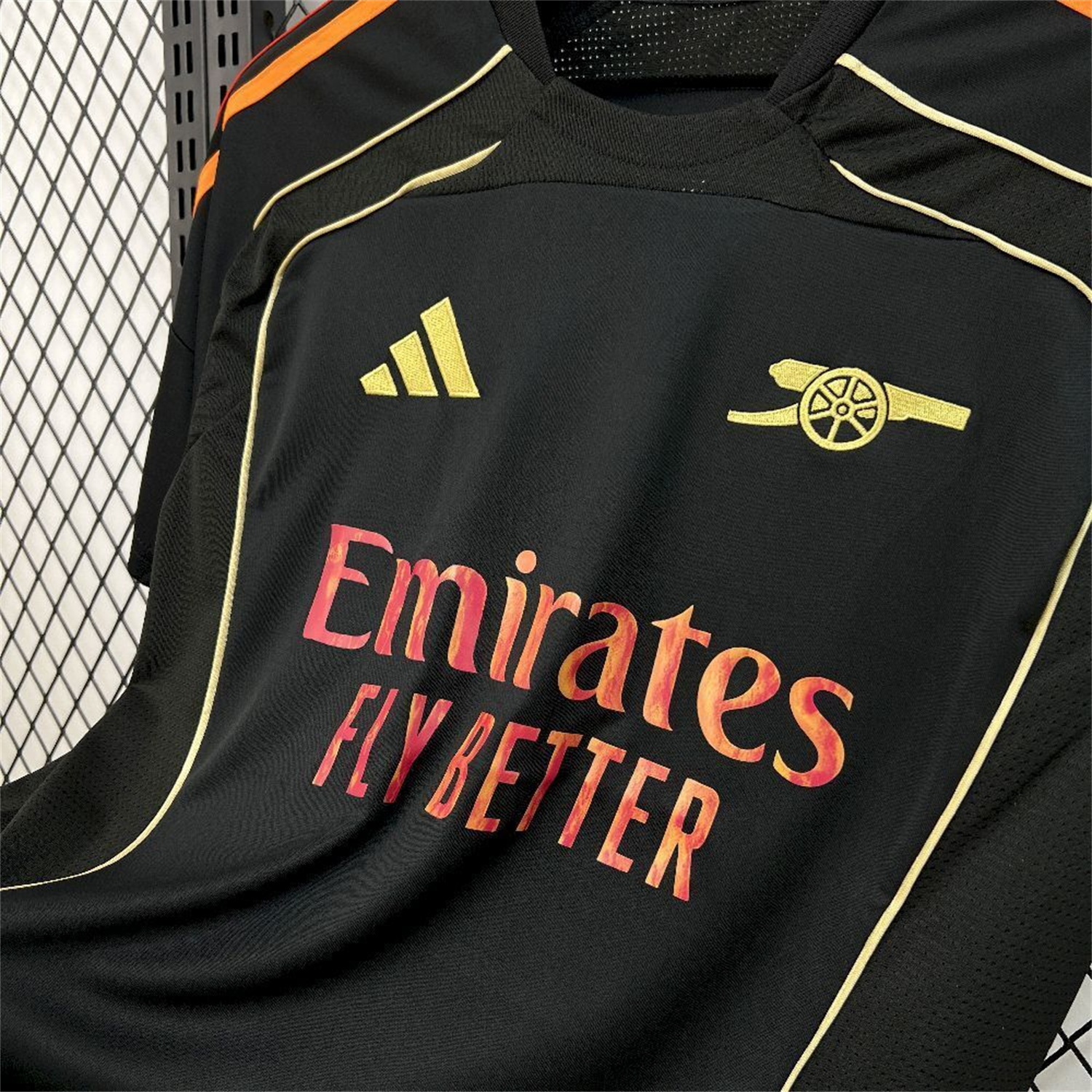 AlphaJersey-Arsenal 25-26 Gold Lines Black Training Jersey - Fans Version