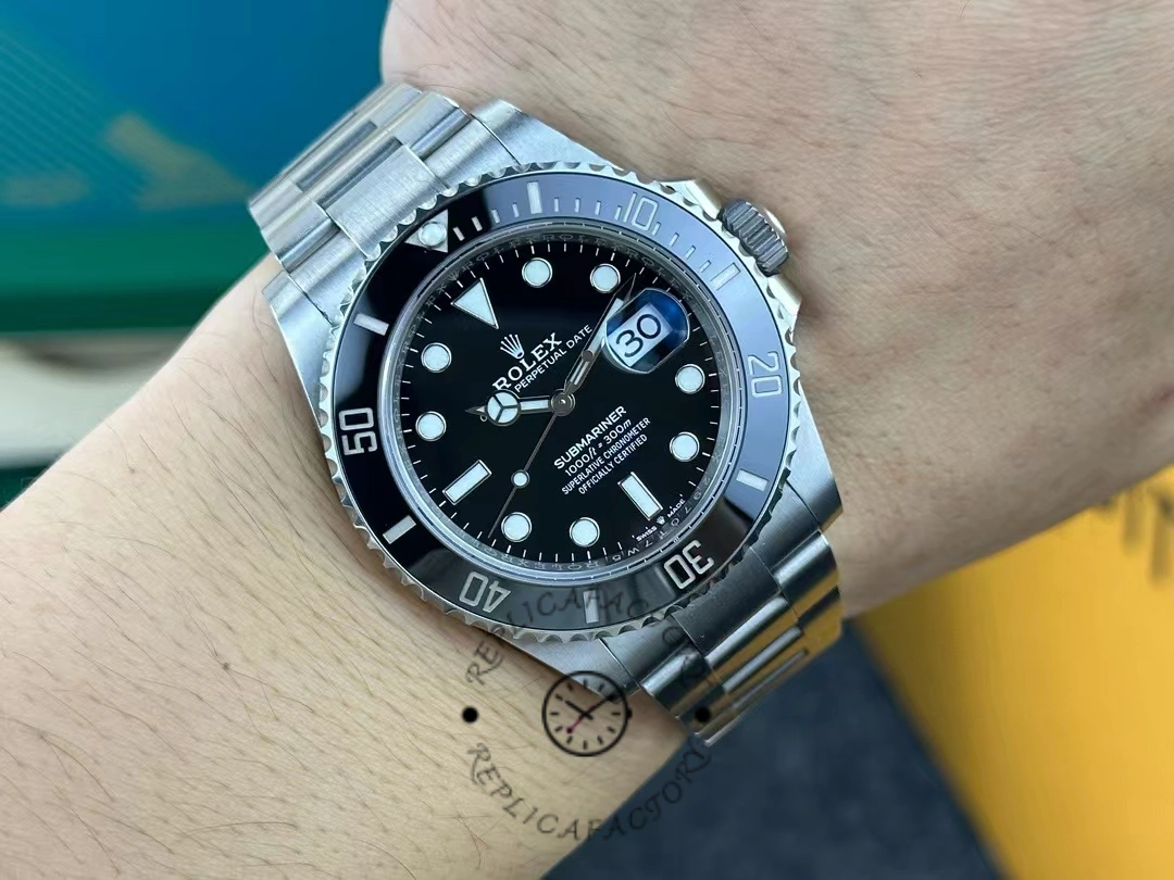 View of the Rolex Submariner 126610LN on a wrist, showing the full dial and bracelet.