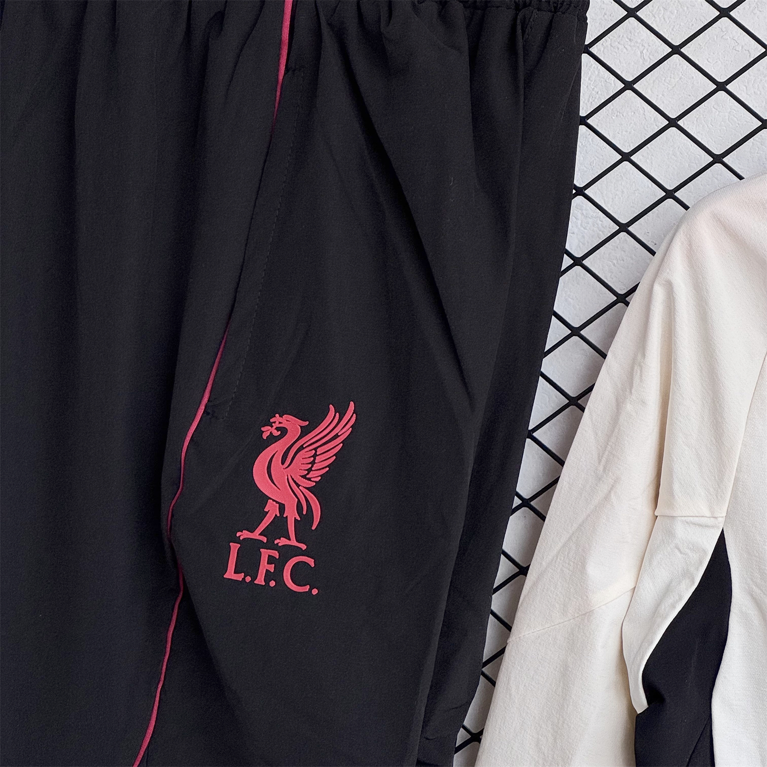 AlphaJersey-Liver.pool 25-26 Hooded Windbreaker Training Set - Cream Top & Black Pants