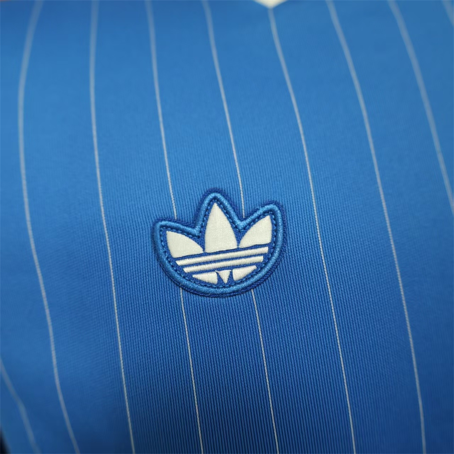 AlphaJersey-Real Madrid 25-26 Trefoil White Lines Blue Travel Jersey - Player Version
