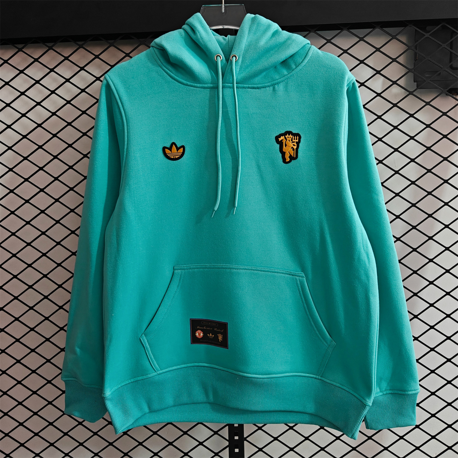 AlphaJersey-Manchester United 25-26 Originals Terrace Icon Unisex Pullover Hoodie with Yellow Logo