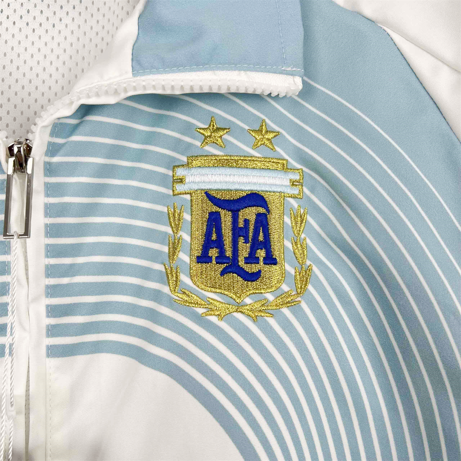 AlphaJersey-Argentina 25-26 Throwback Windbreaker Jacket - White with Blue Lines