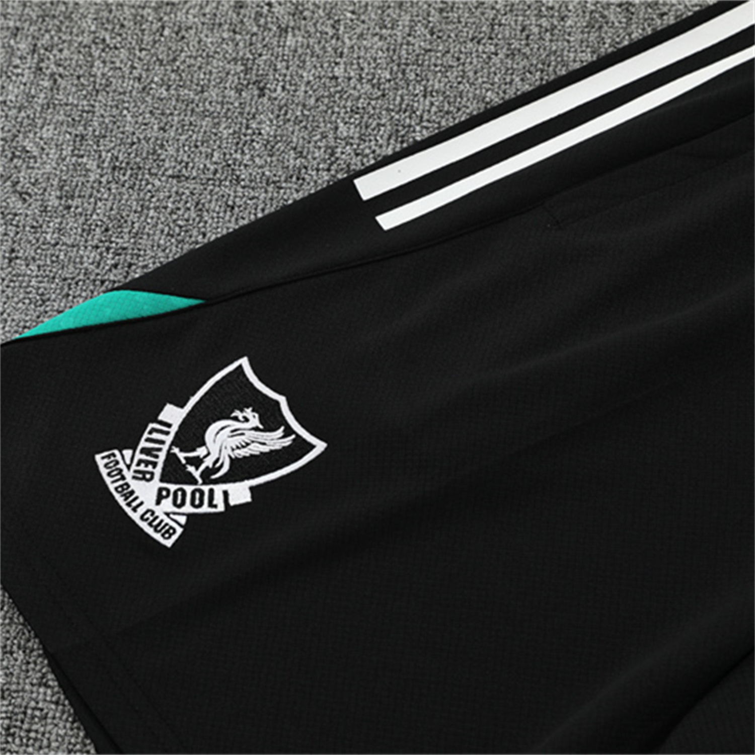 AlphaJersey-Liver.pool 25-26 Short-Sleeve Training Set - Green Top & Black Shorts
