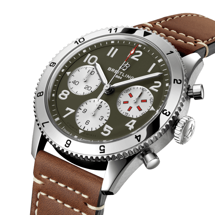 From brave first takeoffs to the birth of commercial air travel, Breitling’s history is inseparable from that of flight. In the 1930s, Breitling’s Huit Aviation department made its name inventing precision cockpit clocks. Two decades later, it introduced yet another novel flight instrument, this time in wearable form: the Ref. 765 AVI. That pioneering pilot’s watch provided the technical backdrop for today’s Classic AVI, a collection inspired by the rugged spirit of famed early aircraft.The Classic AVI Curtiss P-40 Warhawk honors one of those legends. Conceived as a pursuit aircraft, the Curtiss P-40 Warhawk first flew in 1938 and quickly proved itself as a master of agility. It wasn’t just the plane’s capacity for pulling jaw-dropping turns that gave it an in-flight edge, its robust structure meant it could tolerate harsh weather conditions and even many mid-air collisions. The Warhawk’s defiant shark-mouth nose art sealed its reputation as the rebel of the skies.As a true pilot’s watch designed to withstand the rigors of a vintage cockpit, the Classic AVI Curtiss P-40 Warhawk features large, highly legible Arabic numerals on the dial and bezel.The knurled bezel on the 42mm case provides optimal grip, even in a pilot’s gloved hands. Top-stitched calfskin straps give a nod to the seams found on classic flight gear, while the stainless-steel bracelet provides an elegant alternative. Pilots and other travelers will appreciate its legibility, wearability, and understated style. The engine of the Classic AVI is the COSC-certified Breitling Caliber 23 movement, which provides approximately 48-hours of power reserve.