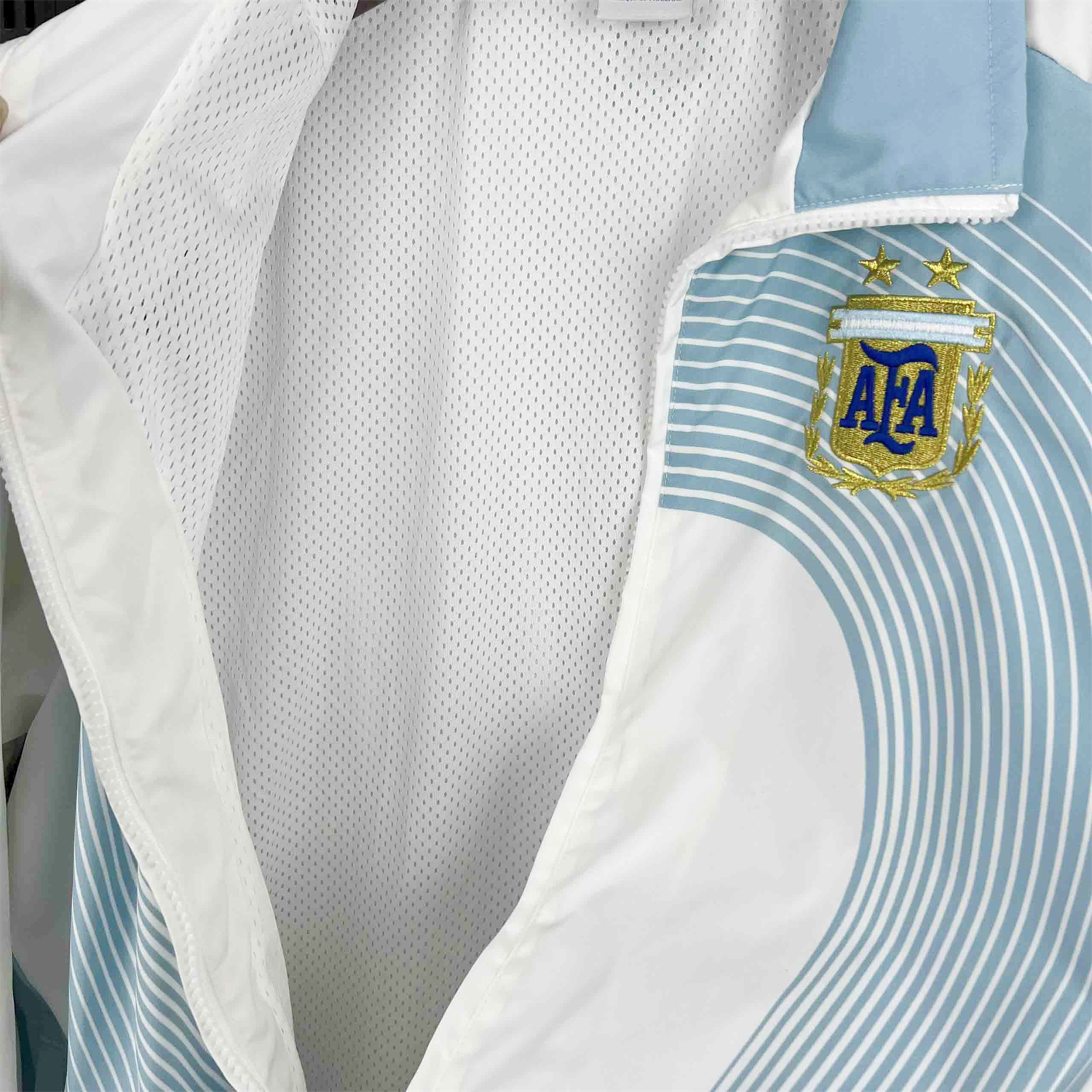 AlphaJersey-Argentina 25-26 Throwback Windbreaker Jacket - White with Blue Lines