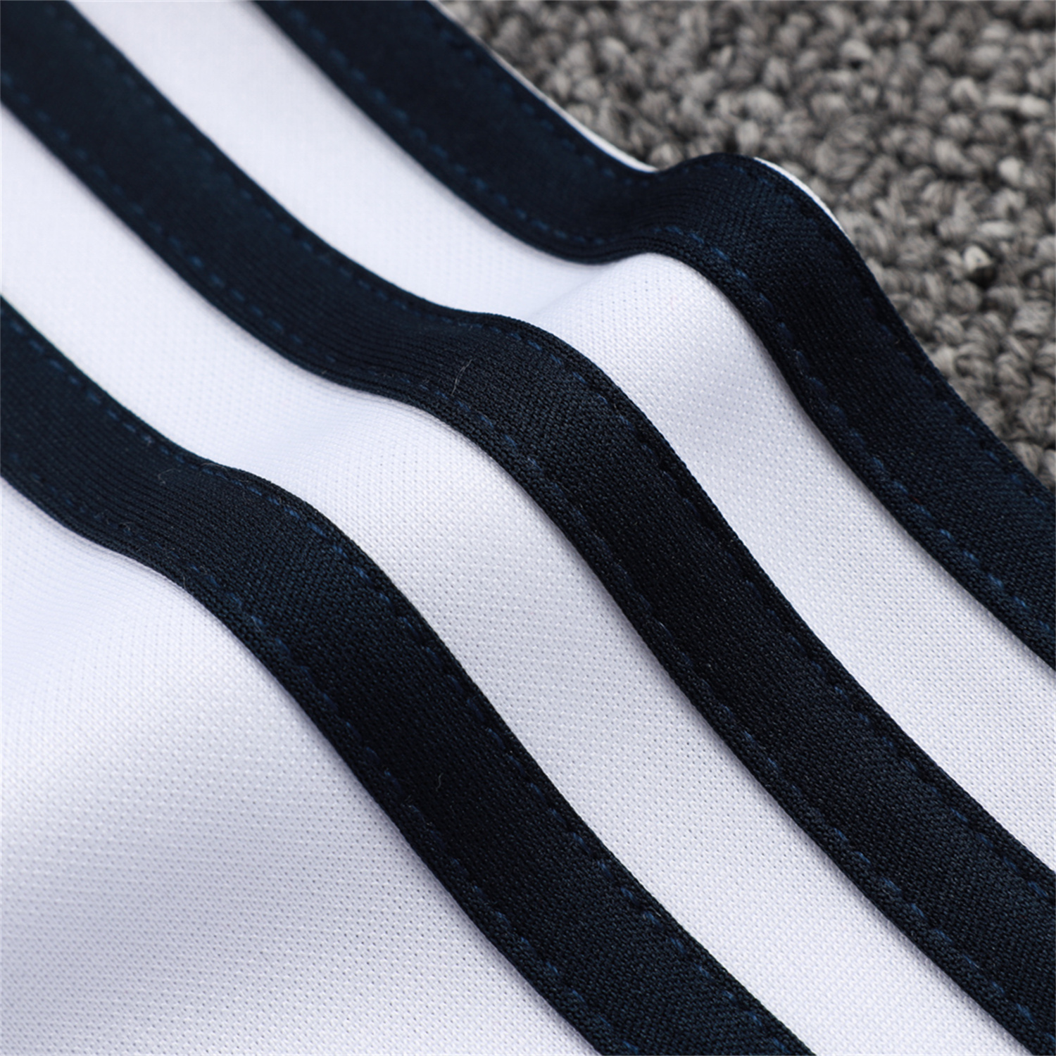 AlphaJersey-Real Madrid 25-26 Long Sleeve Training Set - White Urban Purist Style and Deep Blue Pants