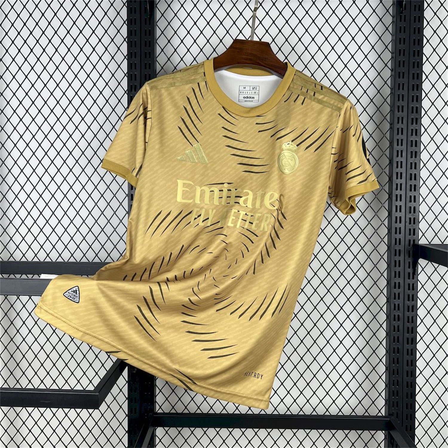 AlphaJersey-Real Madrid 25-26 Gold Swirl Training Jersey - Fans Version