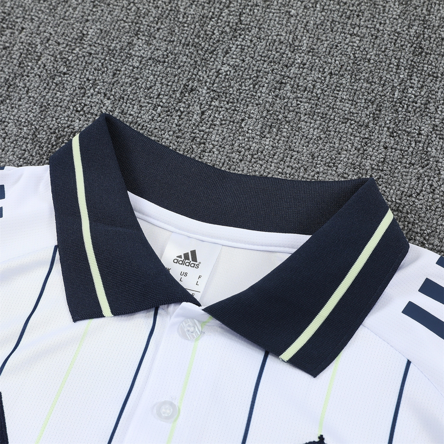 AlphaJersey-Real Madrid 25-26 POLO Short-Sleeve Training Set - Black Line White Top and Black Pants