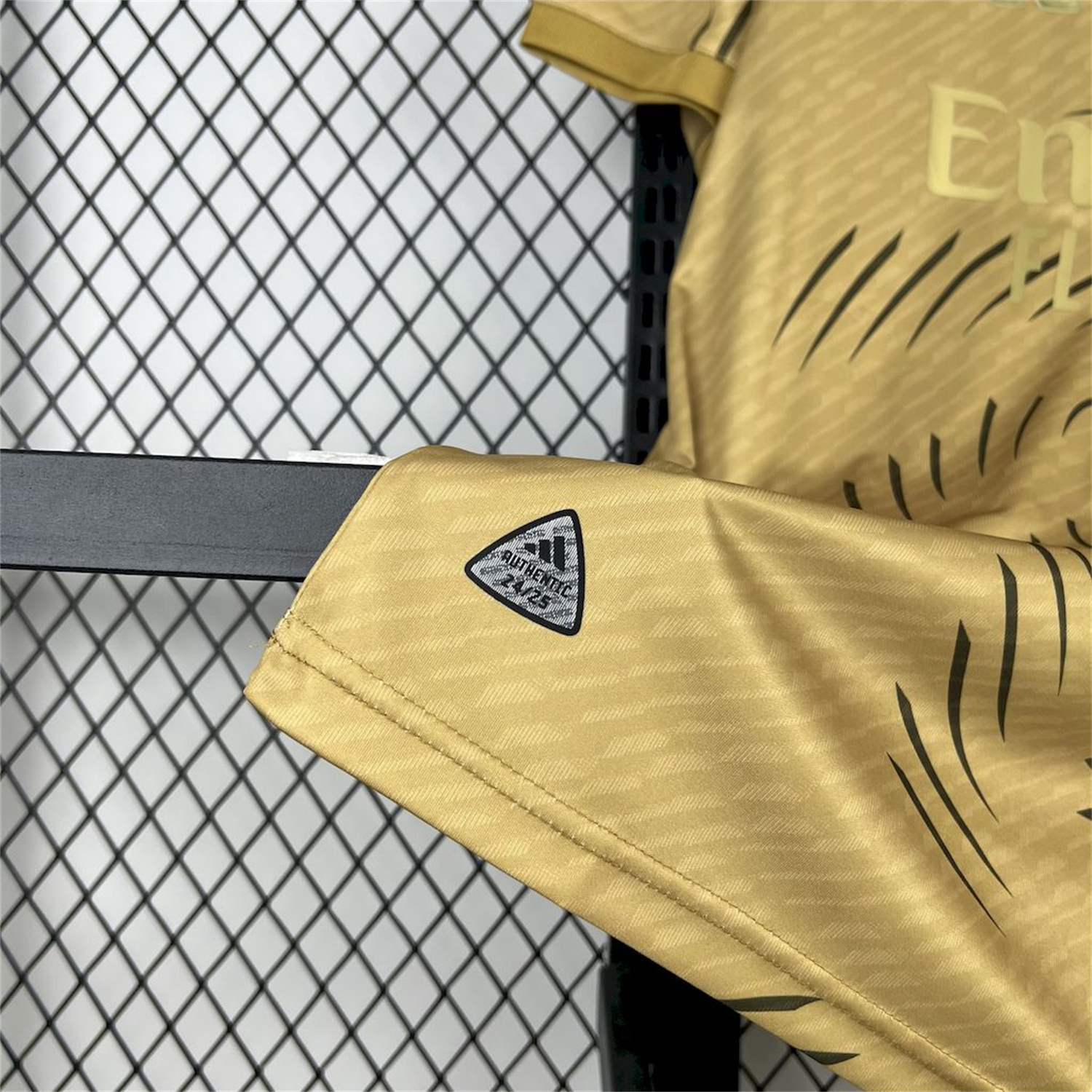 AlphaJersey-Real Madrid 25-26 Gold Swirl Training Jersey - Fans Version