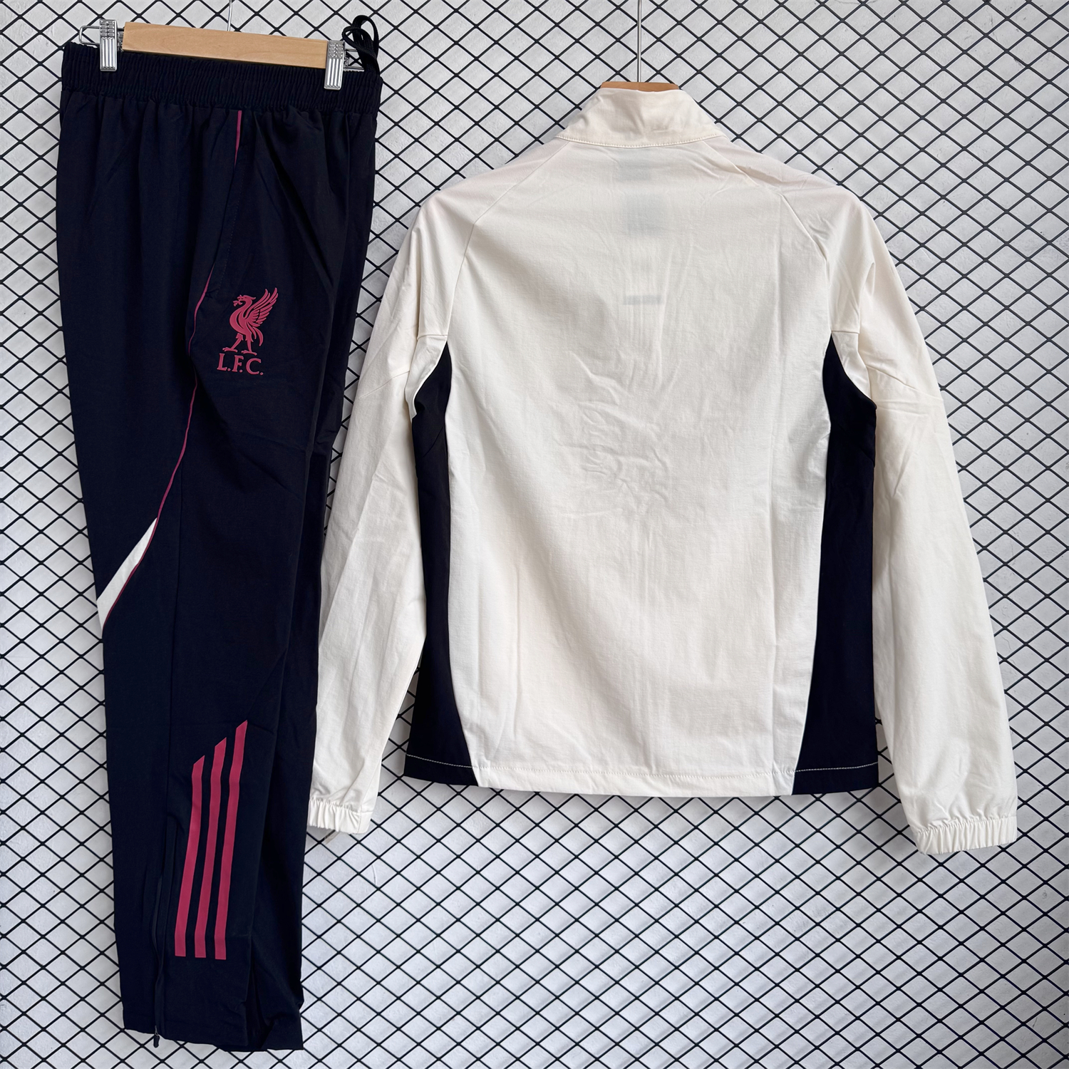 AlphaJersey-Liver.pool 25-26 Hooded Windbreaker Training Set - Cream Top & Black Pants