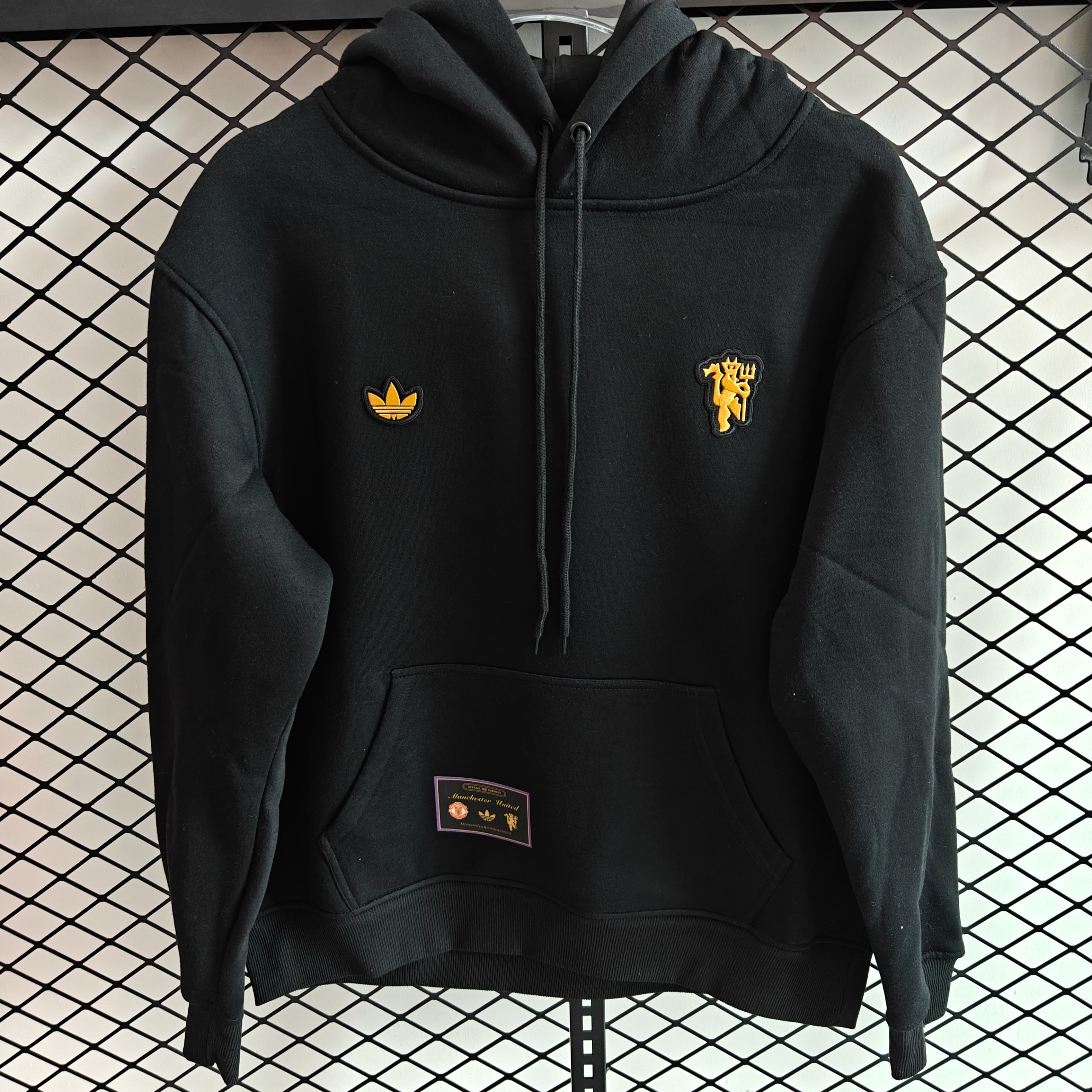 AlphaJersey-Manchester United 25-26 Originals Terrace Icon Unisex Pullover Hoodie with Yellow Logo