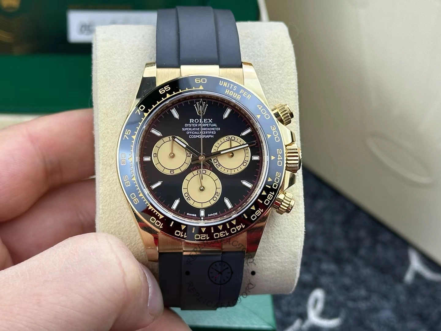 Real photo of Rolex Cosmograph Daytona 126518LN 40mm showing champagne subdials and black ceramic bezel.
