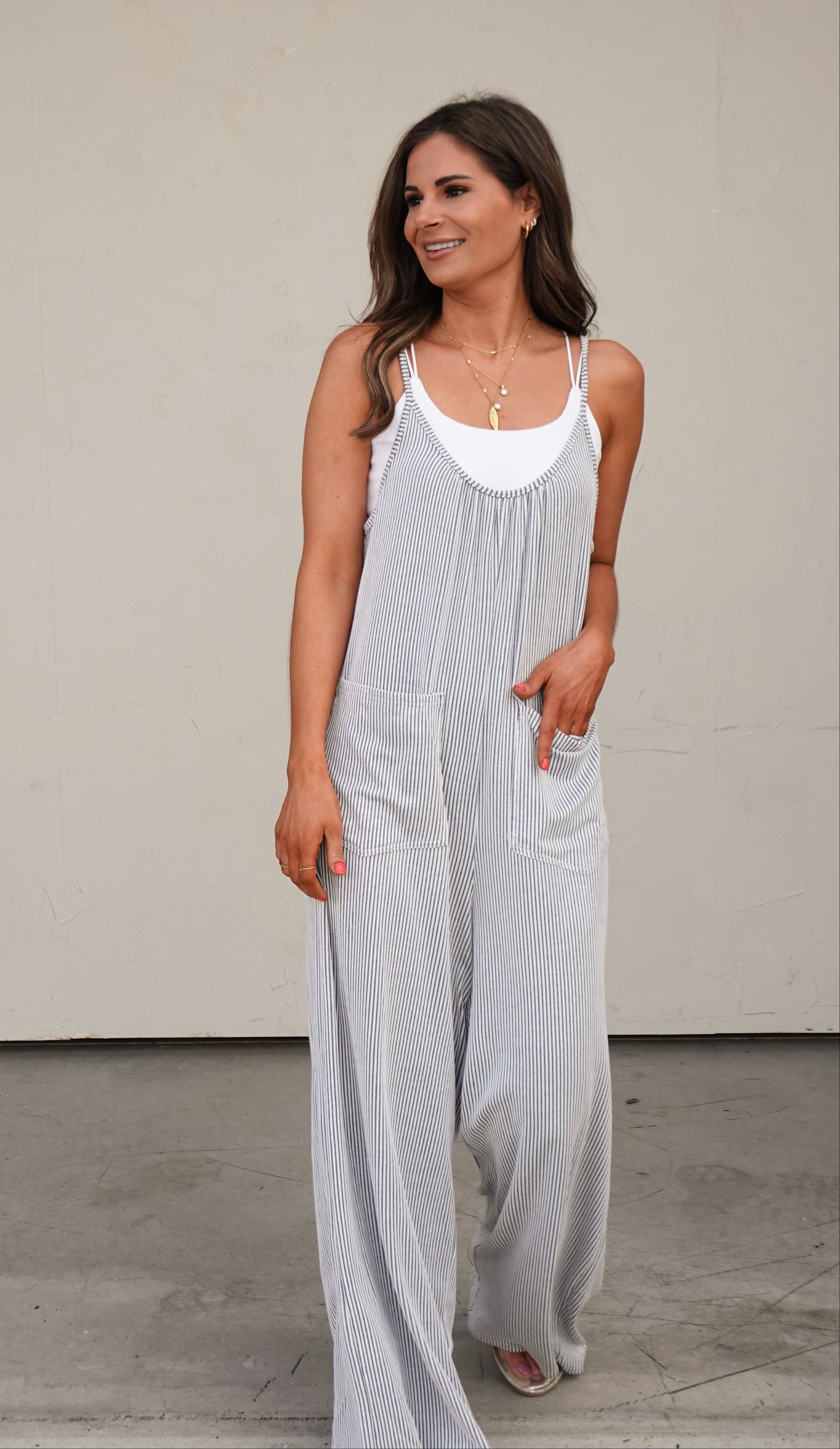 Pinstripe Sleeveless Slouchy Jumpsuit | Elegant Women's Fashion by coolavocek