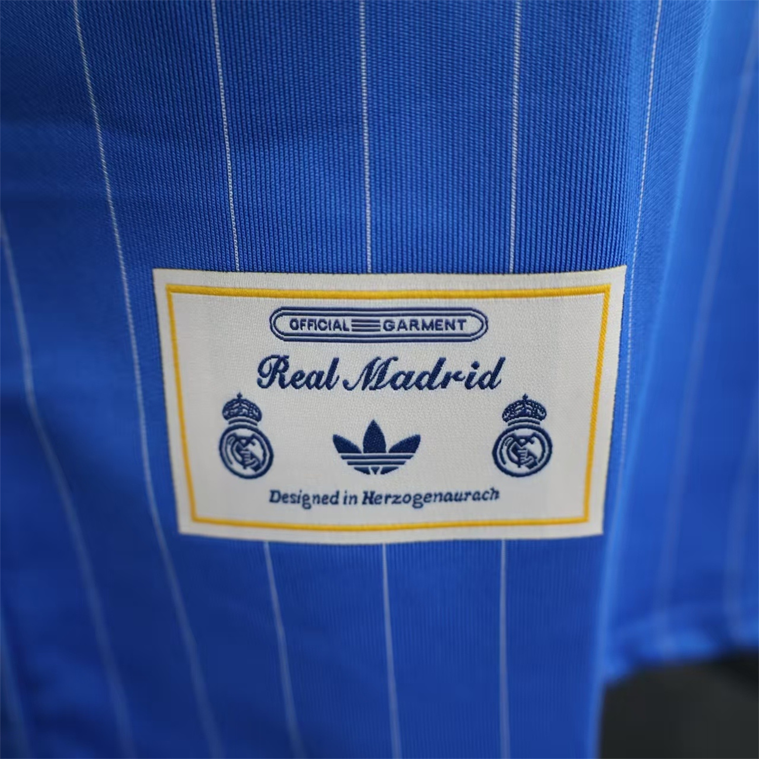AlphaJersey-Real Madrid 25-26 Trefoil White Lines Blue Travel Jersey - Player Version