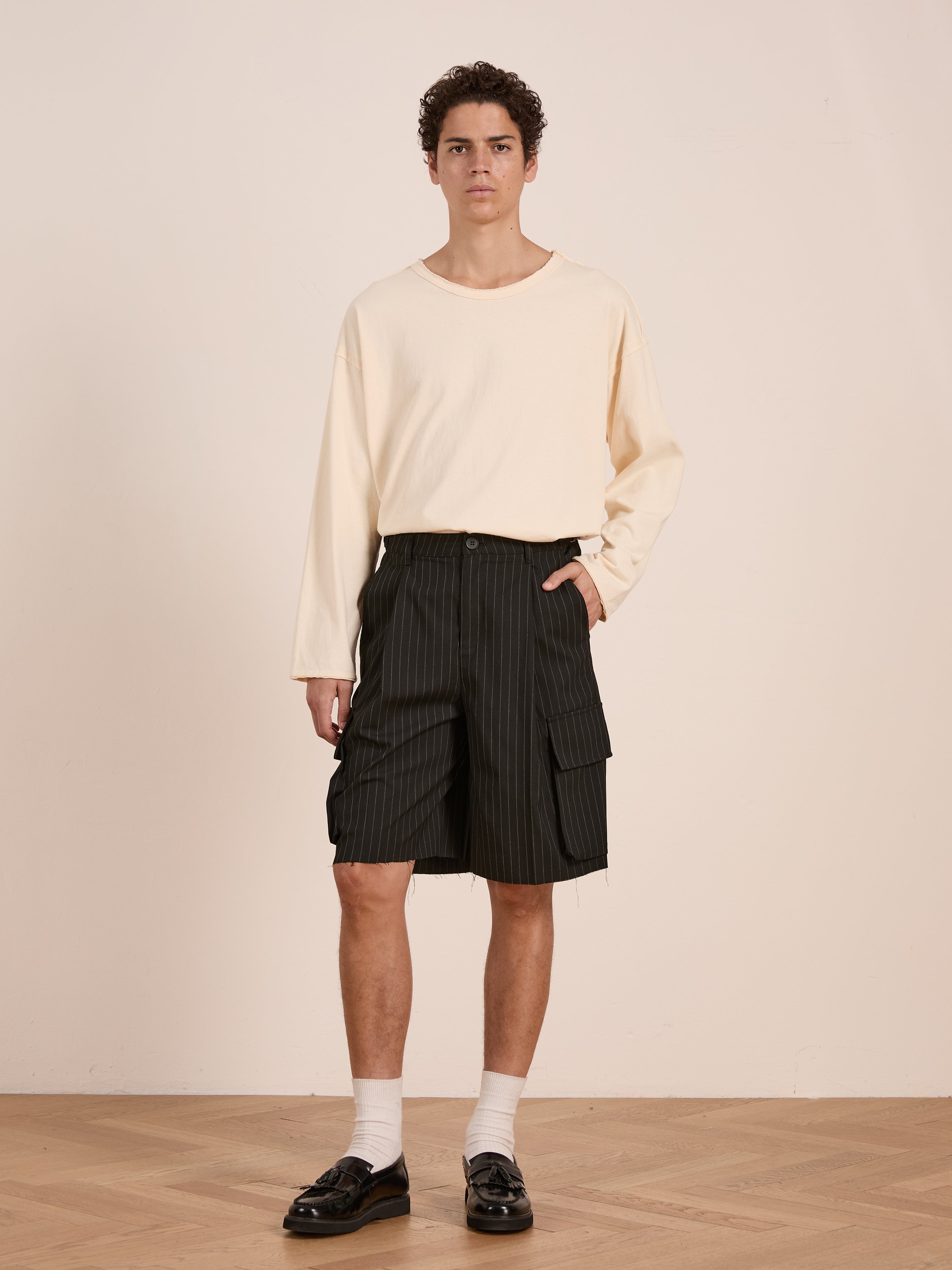Hava Pinstripe Pleated Cargo Trouser Shorts | Modern Menswear by yycbvcnbmmnbm