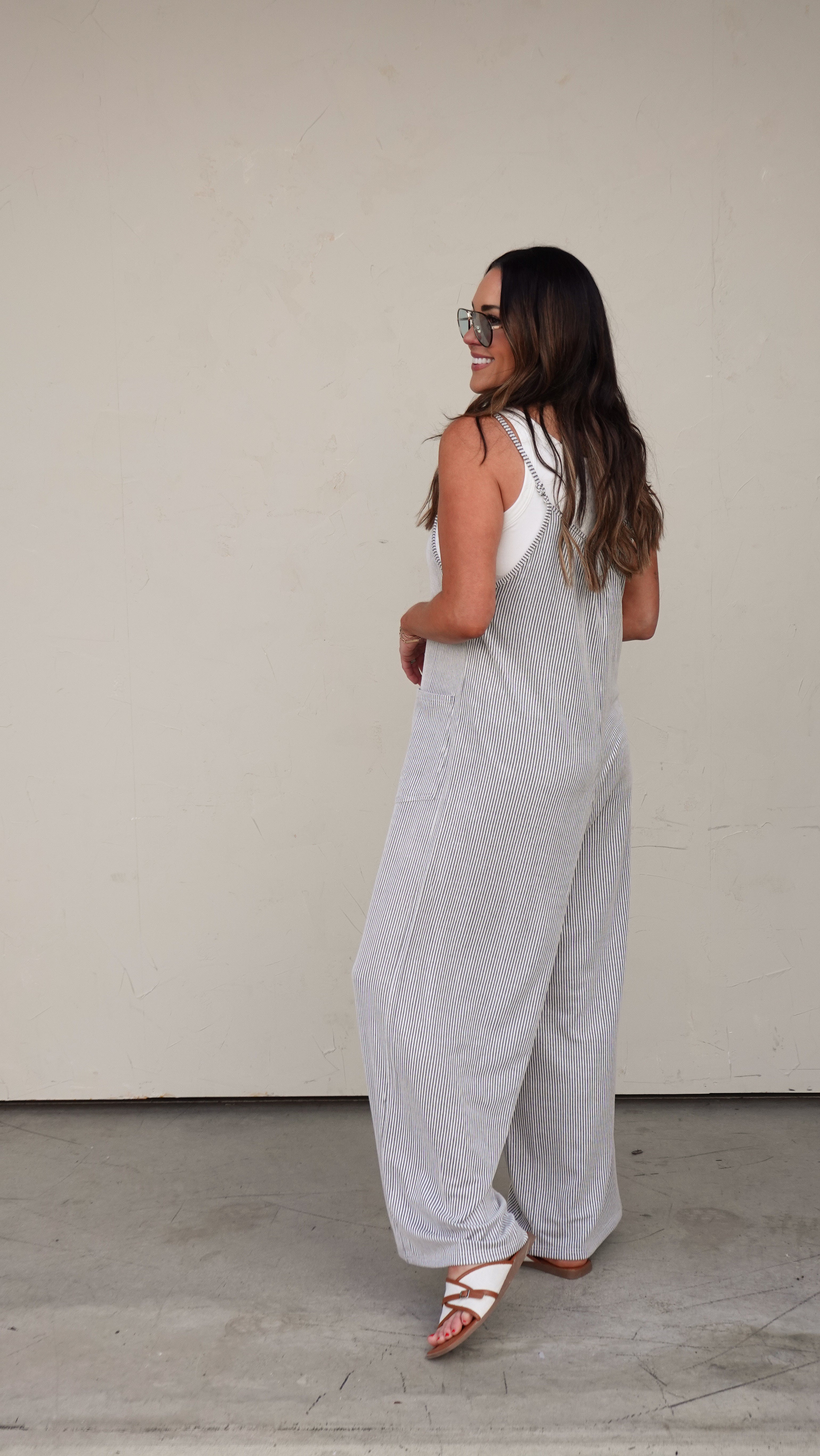 Pinstripe Sleeveless Slouchy Jumpsuit | Elegant Women's Fashion by coolavocek