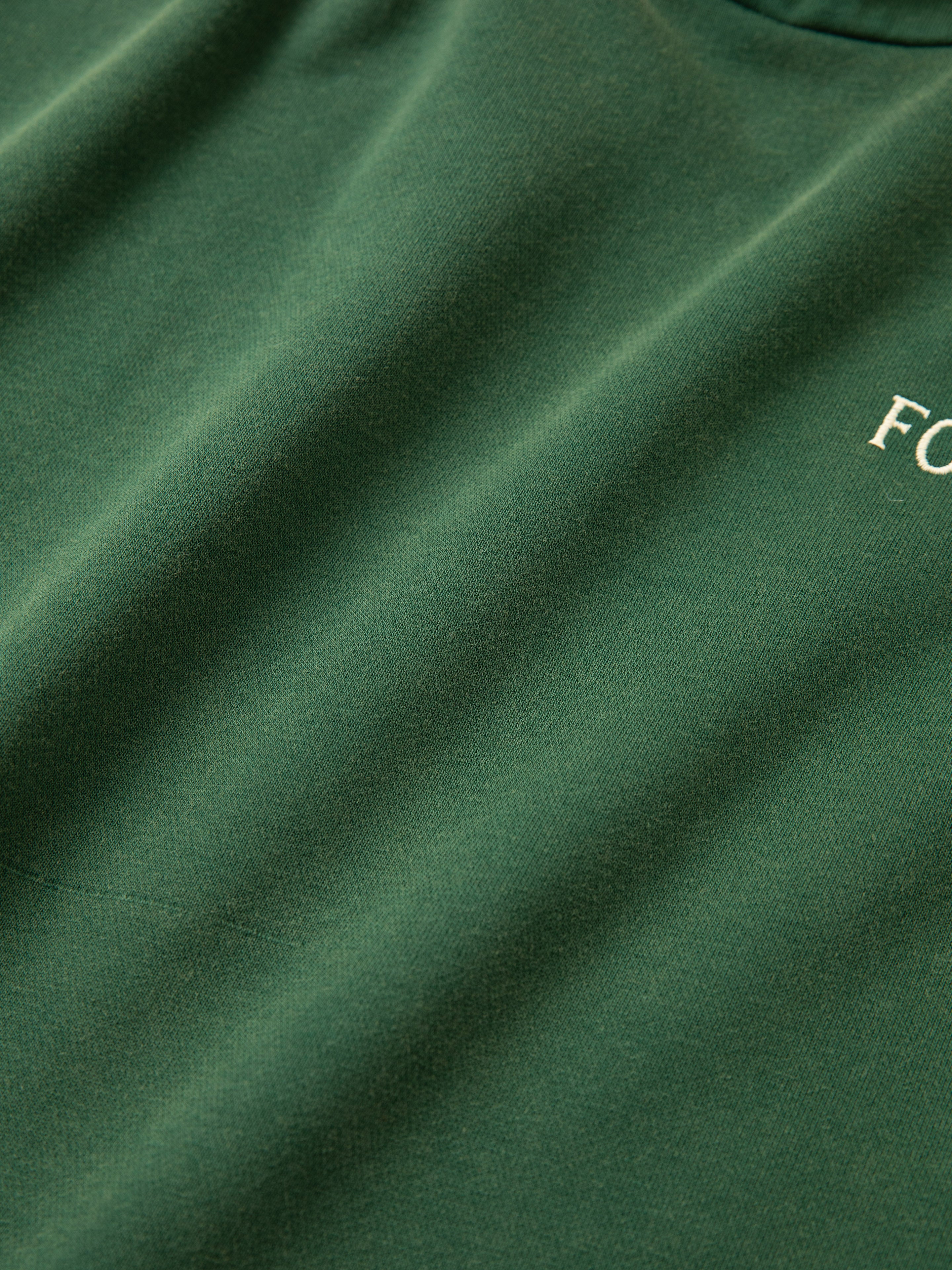 Stitched Border Distressed Logo Hoodie | Modern Menswear by yycbvcnbmmnbm