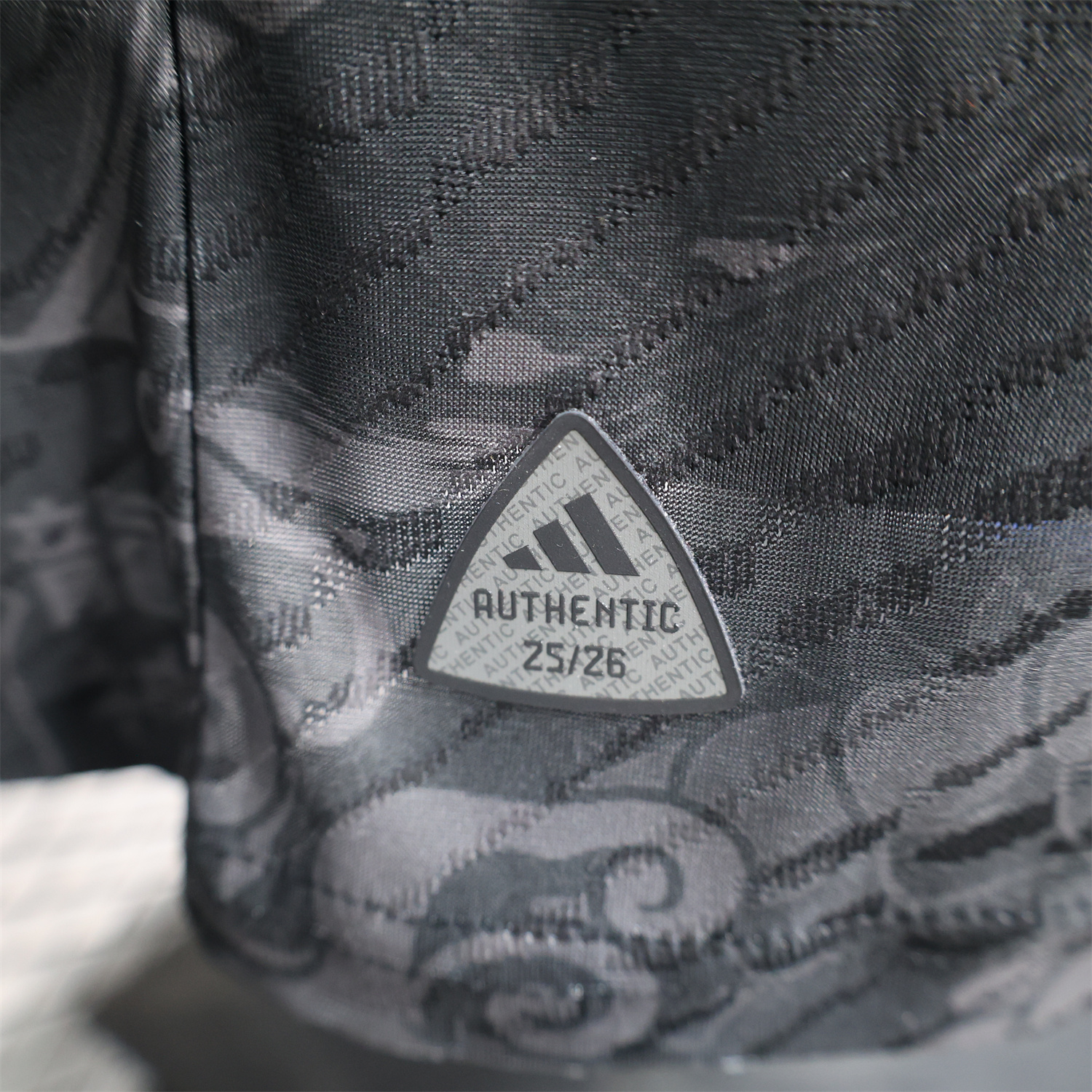 AlphaJersey-Real Madrid 25-26 Grey Chinese Loong and Auspicious Clouds Line Drawing Black Jersey - Player Version
