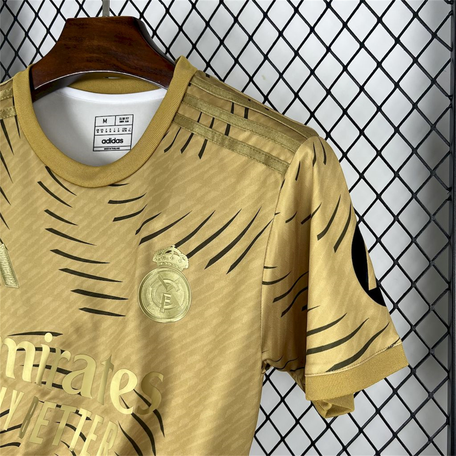 AlphaJersey-Real Madrid 25-26 Gold Swirl Training Jersey - Fans Version