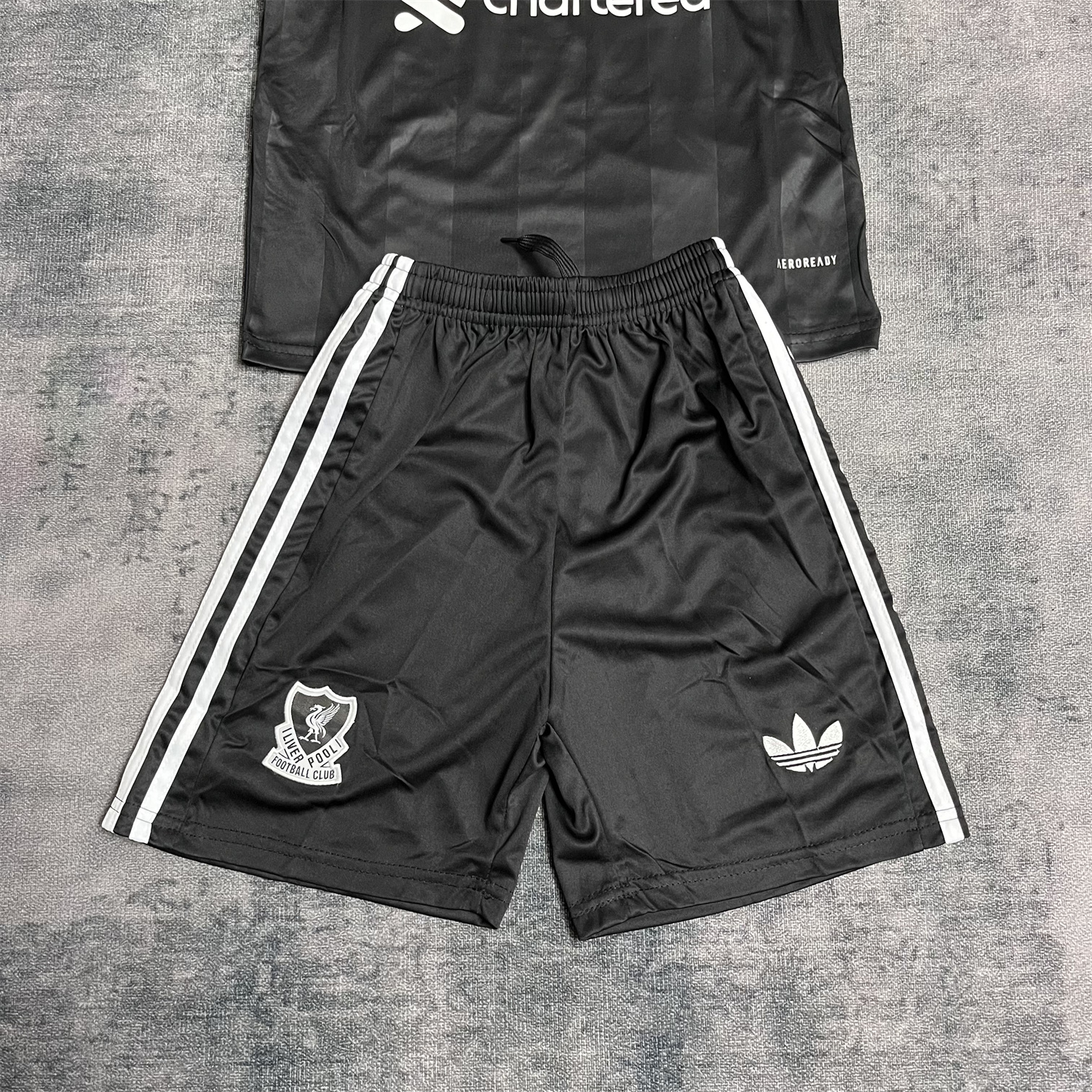 AlphaJersey-Liver.pool 25-26 Trefoil Black Goalkeeper Kids Kit