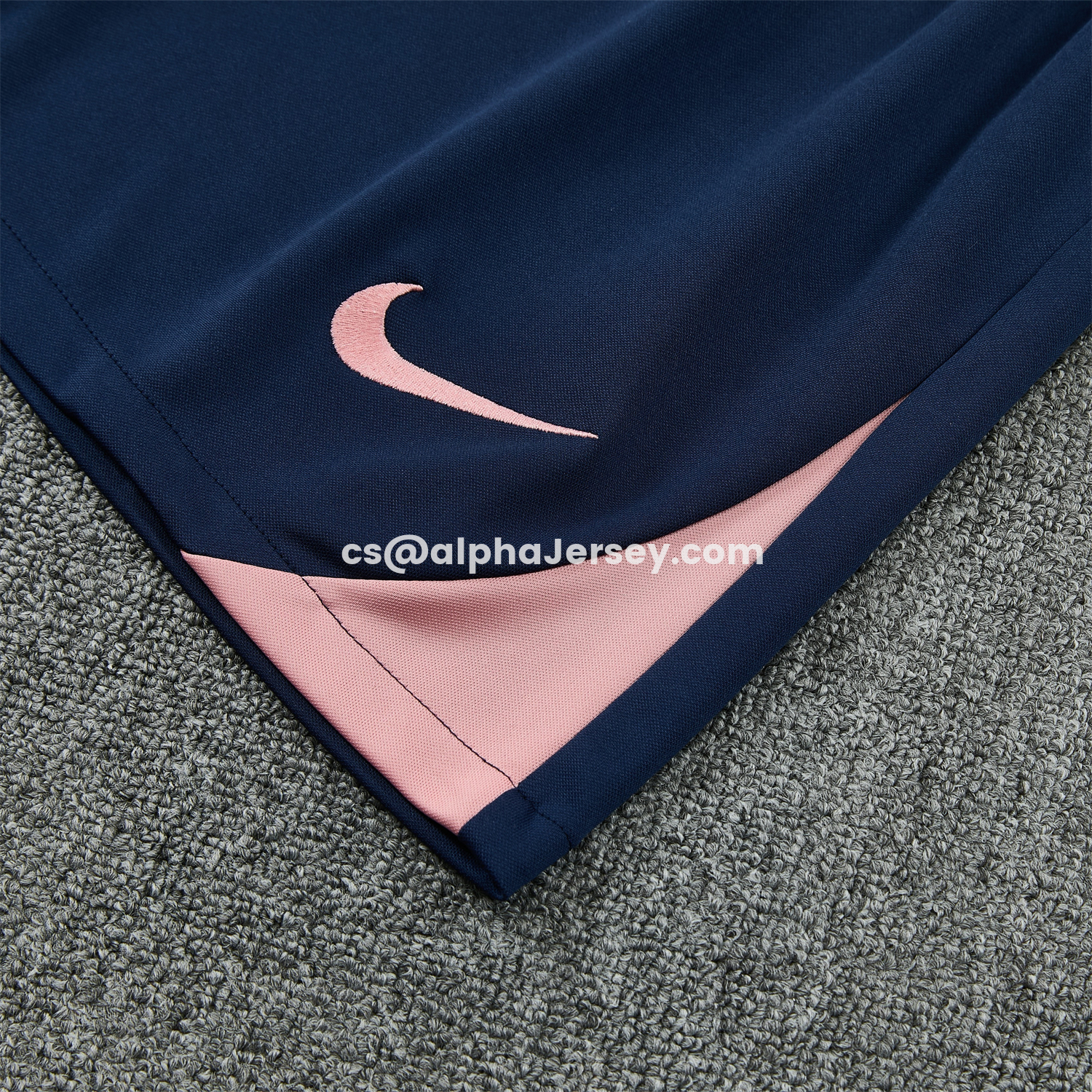 AJ-AlphaJersey-Barcelona 25-26 Short-Sleeve Training Set - Colors Top & Dark Blue With A Small Pink Detail Pants