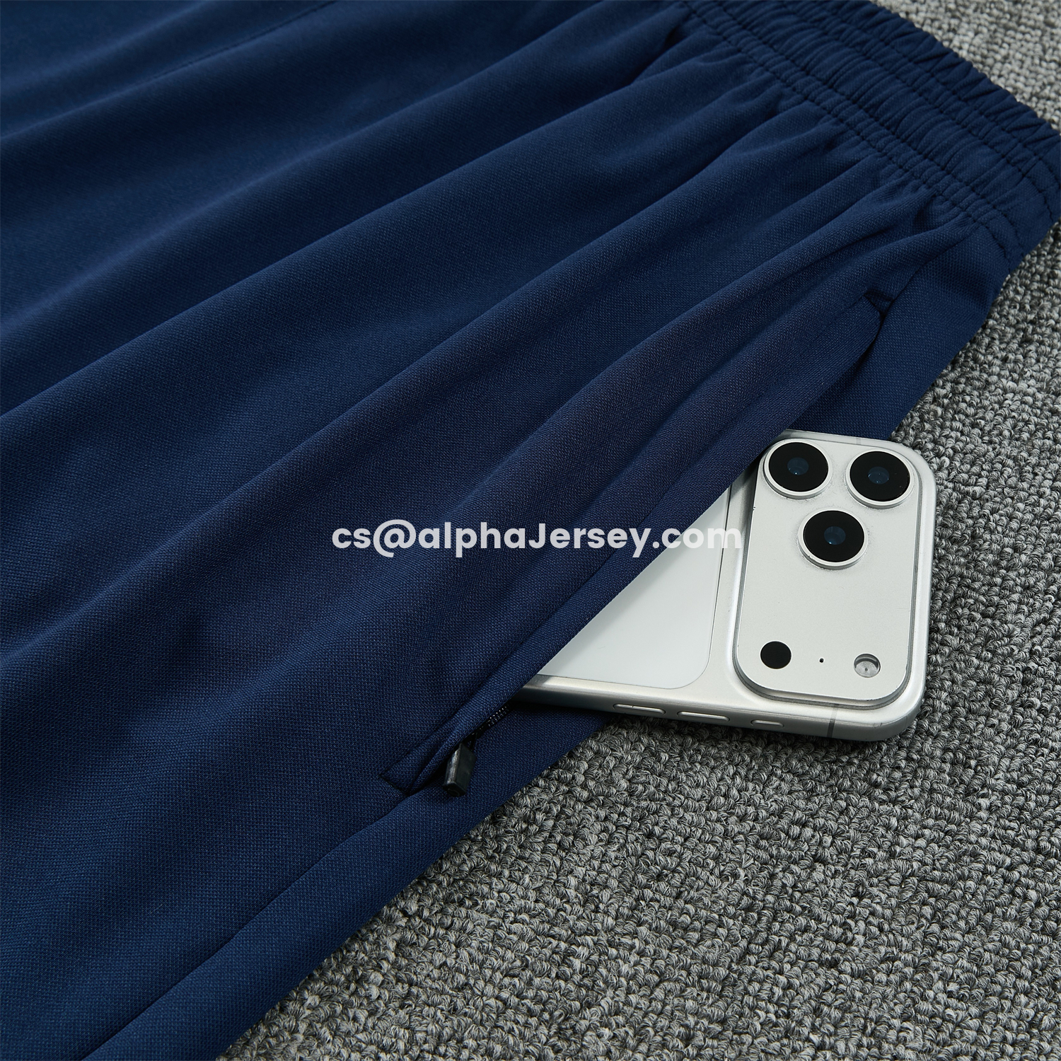 AJ-AlphaJersey-Barcelona 25-26 Short-Sleeve Training Set - Colors Top & Dark Blue With A Small Pink Detail Pants