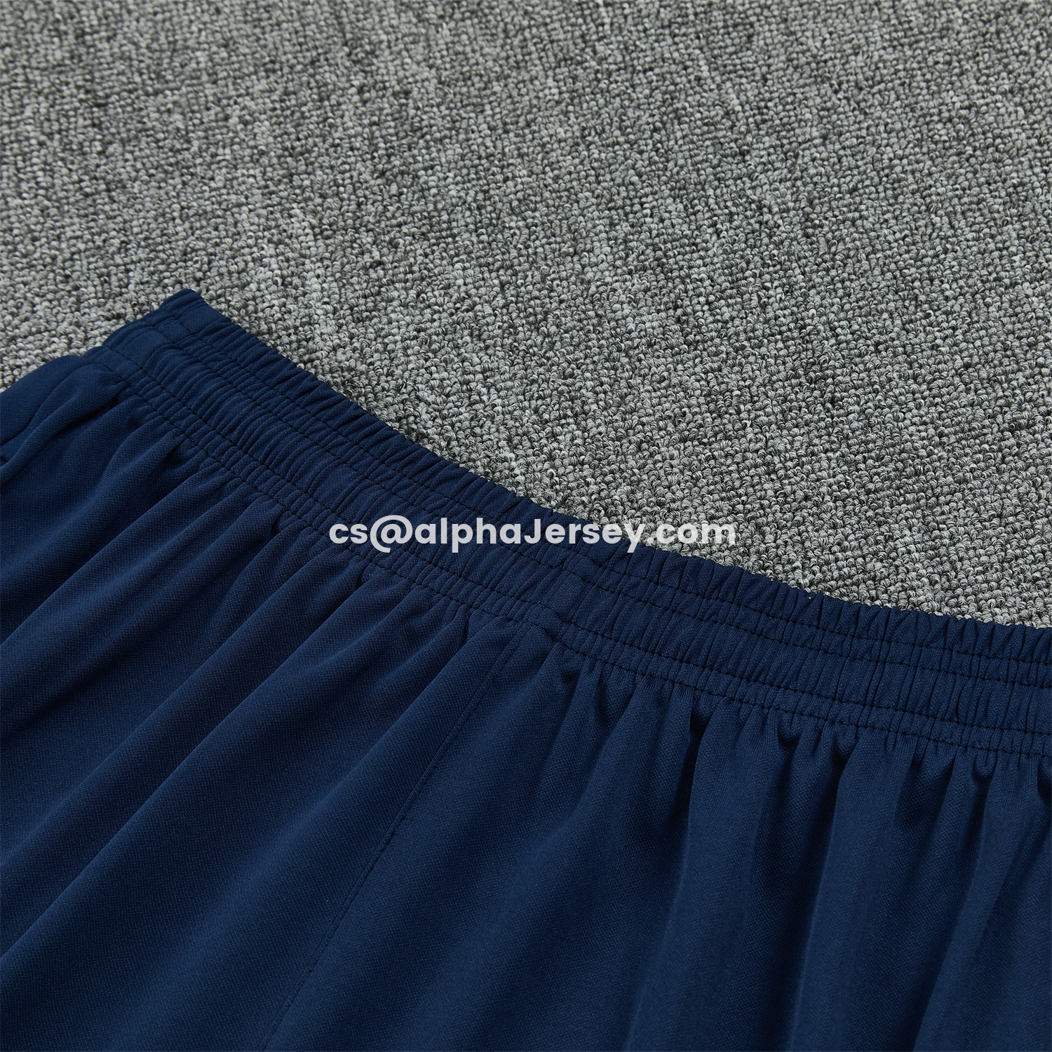 AJ-AlphaJersey-Barcelona 25-26 Short-Sleeve Training Set - Colors Top & Dark Blue With A Small Pink Detail Pants